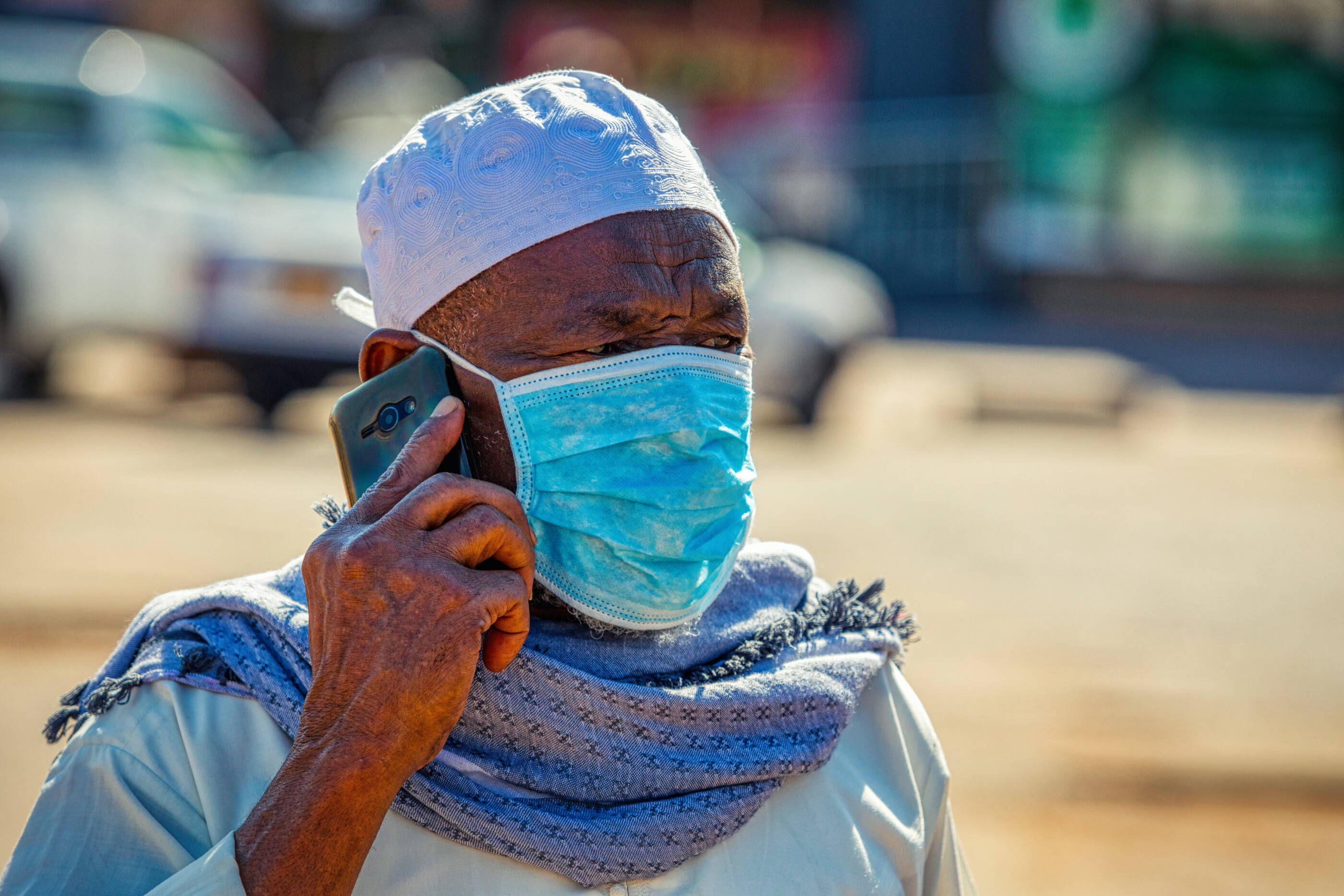 man with the face covered by a mask